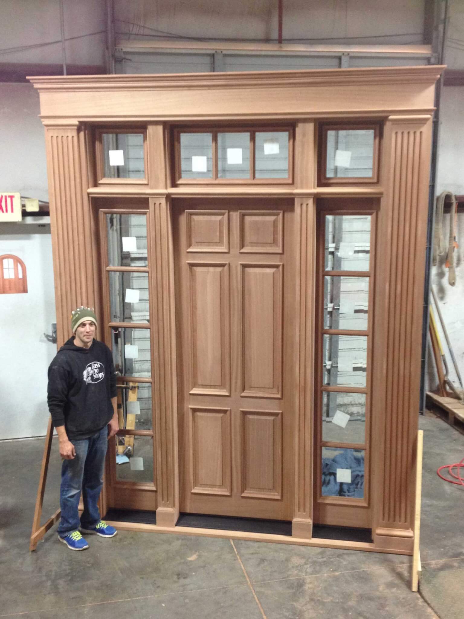 Custom wooden front door with decorative glass in Charleston by MW Millworks