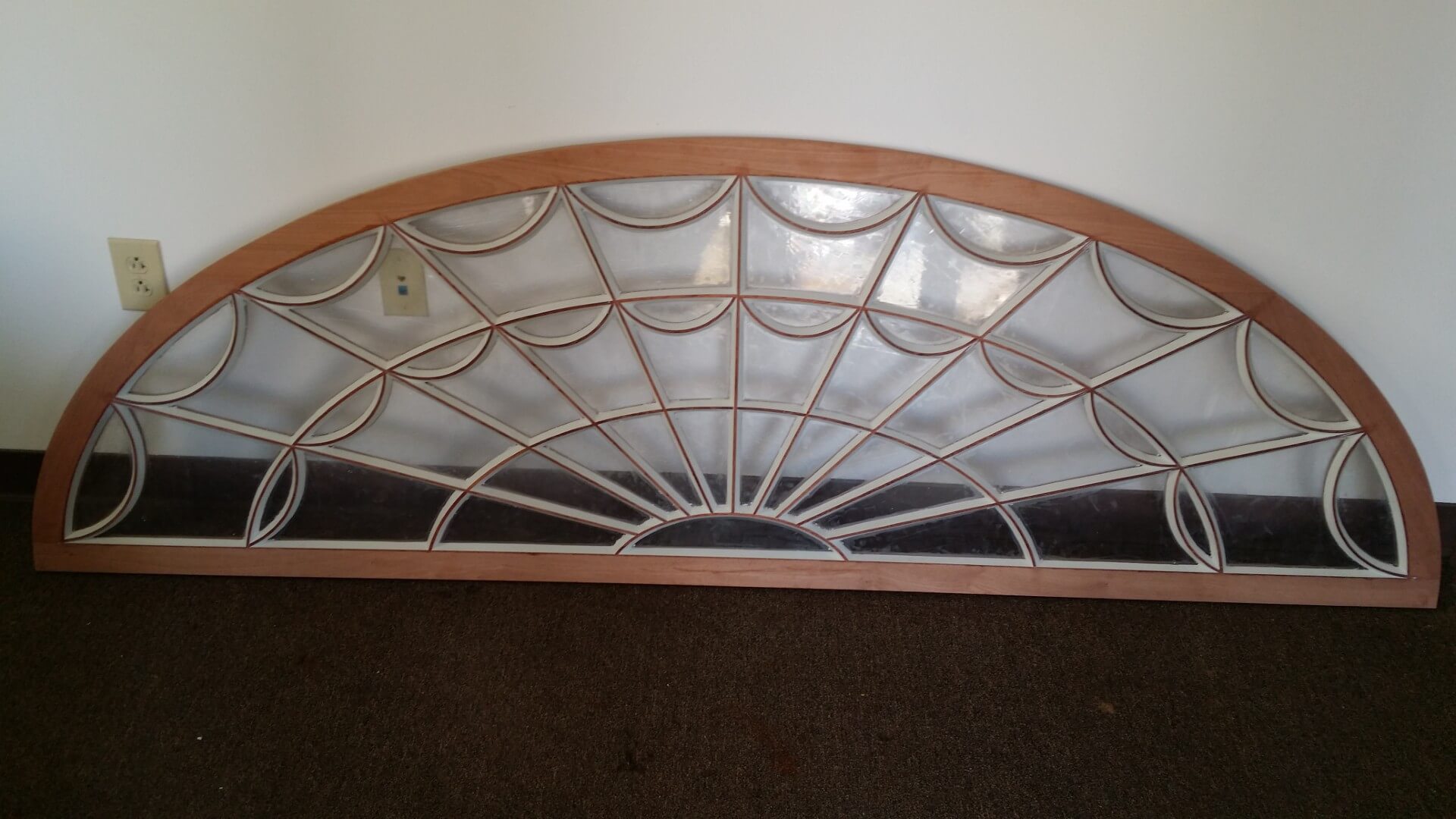 Decorative spiderweb themed door design in Charleston by MW Millworks